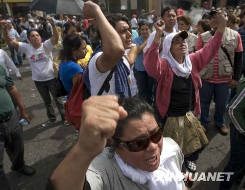 组图：洪都拉斯民众游行示威 反对军事政变