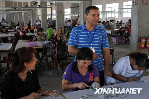 韶关:让新疆外出务工人员长期安心就业(组图)