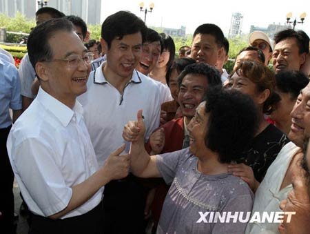 中央保障和改善民生纪实:越困难越要重视民生
