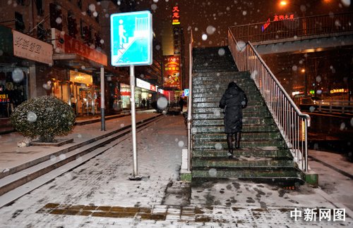 组图:农历小年北京喜降瑞雪