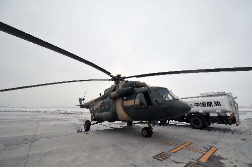 组图：新疆雪崩空中救援因浓雾积冰暂时取消