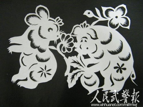 武警士官汝海军:自创字画融合的猴寿剪纸