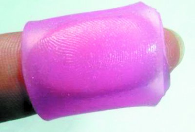 指纹打卡也作假 100元可网上订制克隆指纹套