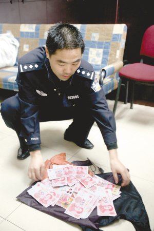 重庆打掉3大丢包诈骗团伙之一 证据达800多页