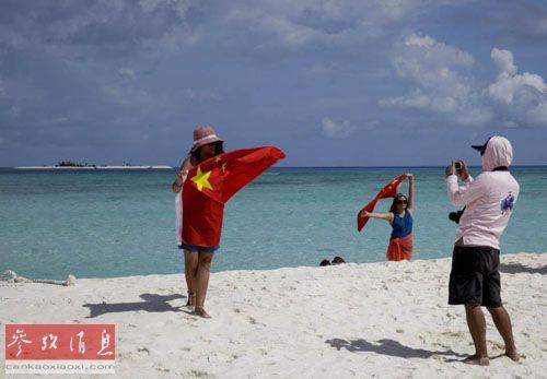 外媒：中国推西沙旅游宣示主权 游客国旗前宣誓