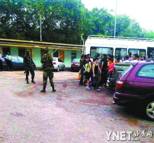 June 2013, ghana soldiers and police collects golden person to reside a dwelling place to execute the law in China examination.  