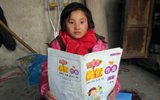 山村儿童渴望看书 一本课外书全校传着看