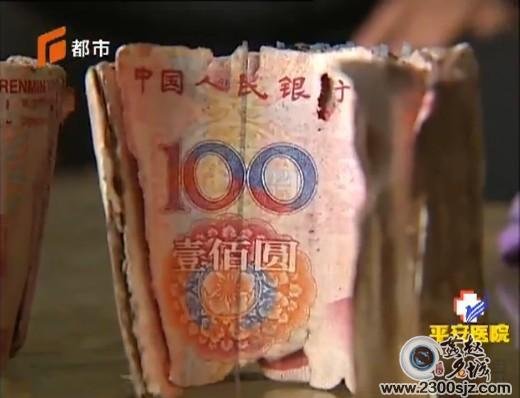 老太把钱埋土里 重金变废纸