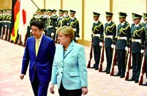 德国总理默克尔提醒日本对历史“勿紧闭双眼”