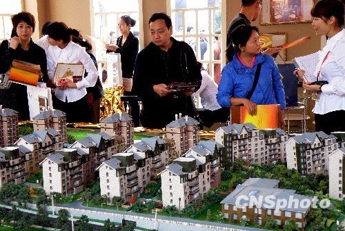 统计局数据显示，3月份70个大中城市新房房价上涨城市为68个，其中北京、上海房价涨幅明显。资料图。
