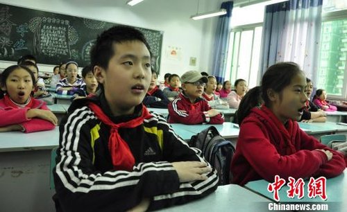 重庆九龙坡提倡国学教育 小学生读孔孟习古韵