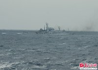 高清：中国渔政船在钓鱼岛海域与日本舰机对峙
