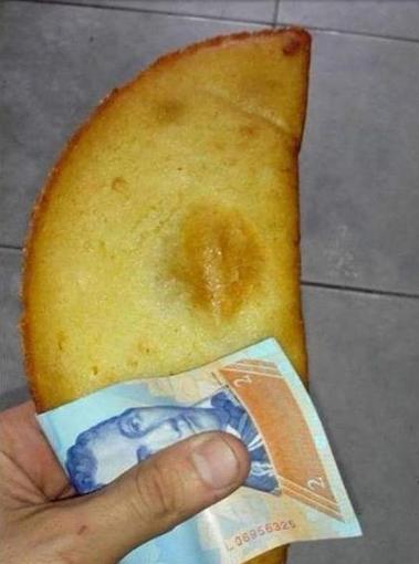 委内瑞拉纸币大幅贬值 小偷劫匪都不偷抢