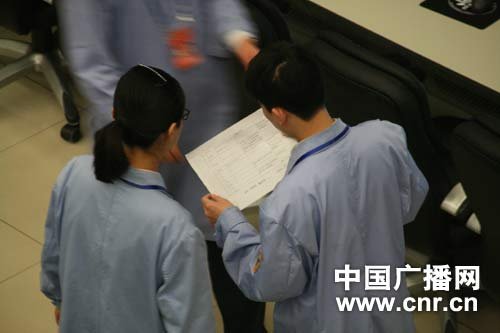 组图：北京飞控大厅科研人员正忙碌工作