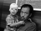 "Alive": las máscaras a Beijing muñeca