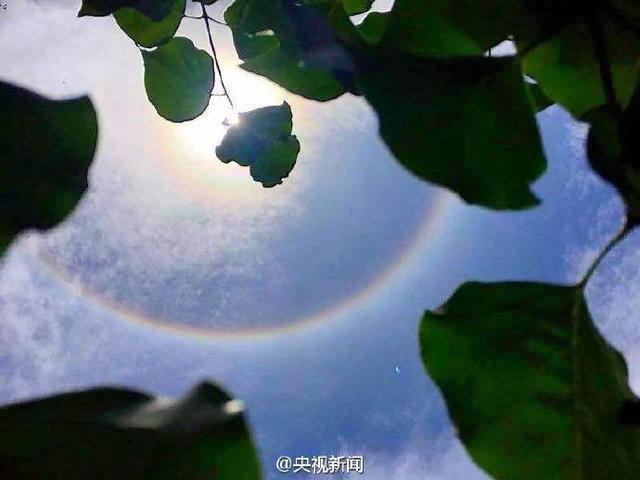 陕西汉中现罕见“日晕”景象 太阳自带“光环”