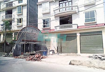 两家起摩擦 一言不合把坟修到别人家门口(图)
