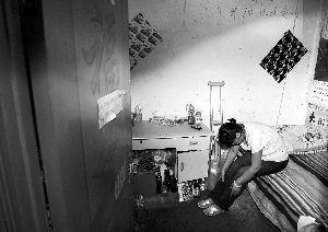 女子为离婚抢劫求入狱 自称不堪忍受家暴(图)
