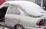 零下14℃!内蒙古呼伦贝尔汽车被冻成“冰雕”