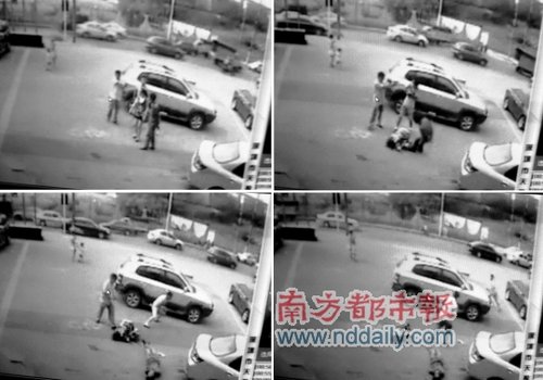 昨日，重庆沙坪坝发生一起持枪抢劫案，现场的视频截图。新华社发