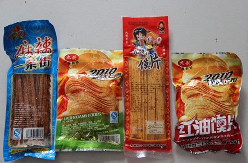 湖南老板开无证小食品厂 一月能赚一辆奥迪