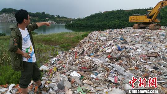 太湖被非法倾倒万吨垃圾 上海：均系建筑垃圾