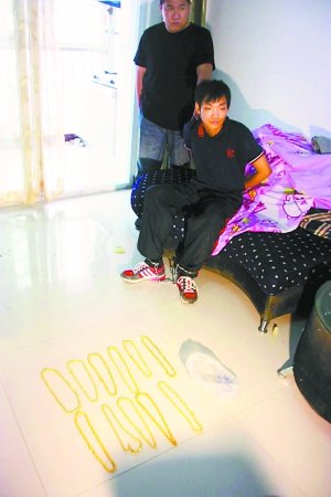 北京男子持斧抢劫金项链15条获刑12年