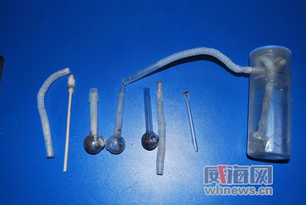 冰壶,玻璃管等吸毒工具.