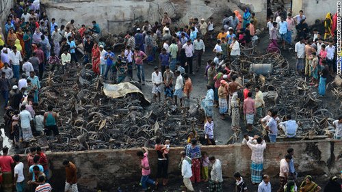 孟加拉国首都贫民窟发生火灾11人死亡500间房被毁_新闻_腾讯网