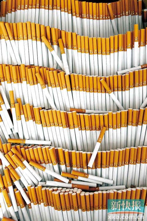 广州警方破获最大制售假烟案 缴获假烟近6000