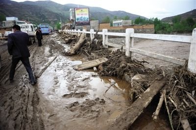 甘肃致53死雹洪灾害调查:防洪设施年久失修