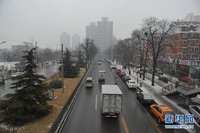 高清组图：北京冰天雪地雾朦胧 路人多摔倒