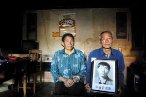 青年追抢匪被杀 父亲申请见义勇为五年未果 青年追抢匪被杀 父亲申请见义勇为五年未果