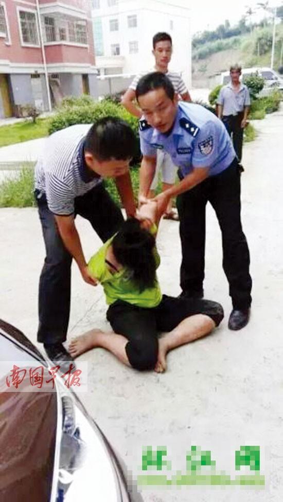 女子不慎失手捂死35天侄女 欲携女跳楼(图)