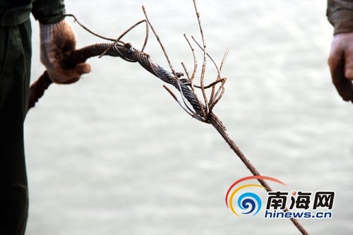 挖沙船刮断两输电线路 海口海甸岛一带停电恢