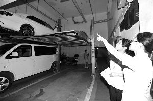业主为停4辆车私建立体车位 物业起诉要求拆除