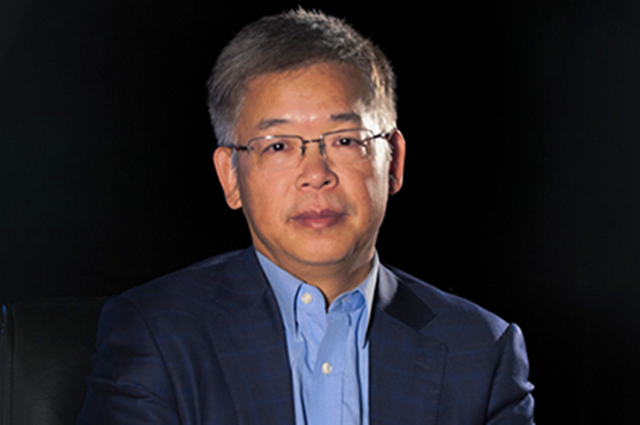 图为北京大学国家发展研究院教授、央行货币政策委员黄益平
