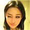 Zhang Xin pour des photos privées