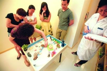 玩游戏解心暑 沙盘诊疗已被纳入医保体系