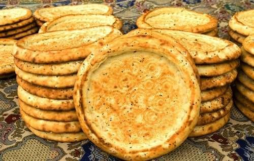 维吾尔人的传统美食 揭秘新疆馕背后的故事_大申网_腾讯网