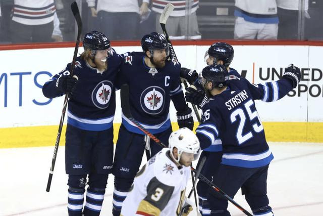 NHL西决-首节打入三球 喷气机主场4-2战胜金骑