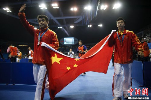 马龙、王皓分获亚运会乒乓球男单冠亚军