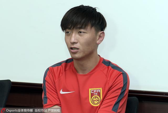 杨旭:卡塔尔队踢个人足球 纪律性比较差(图)