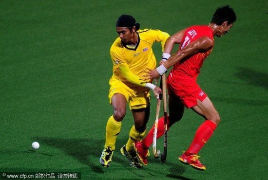 图文：曲棍球男子预赛 马来西亚2-1中国