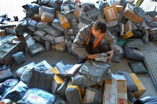中国快递垃圾惊人：年耗170亿米胶带99亿个纸箱