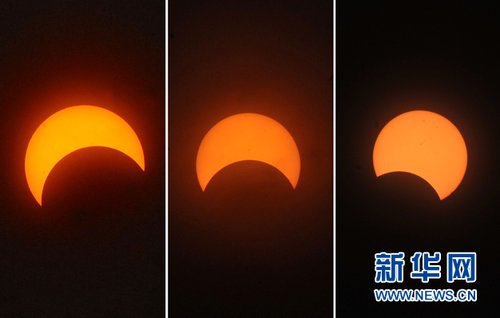 5月21日清晨，在北京拍摄的日偏食（拼版照片）。当日清晨，天宇上演日环食天象，我国境内所有环食区及部分偏食区可欣赏到太阳"带食而出"的奇景