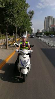 警保联动践行承诺 电动车巡查彰显人保服务