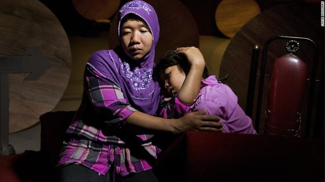 东南亚<em>女佣</em>海外打工遭凌虐_新闻_腾讯网