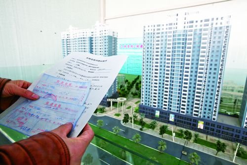 在房屋认购书和文林佳苑售楼处的沙盘上