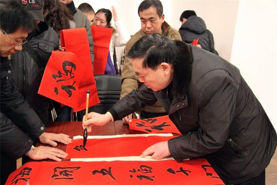 红星国际迎新春,送春联活动温情落幕